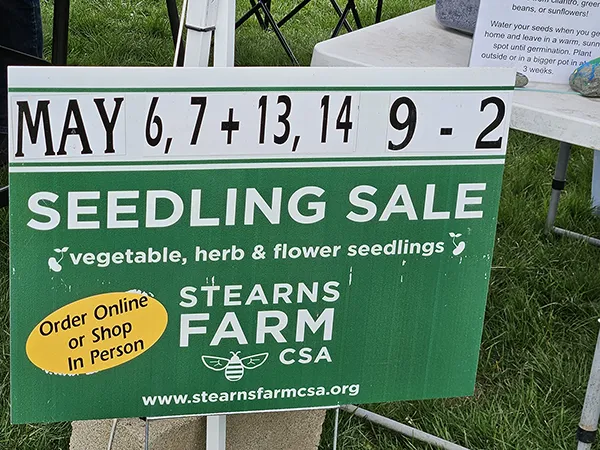 Sign showing Seedling Sale May 6, 7 + 13, 14 9-2