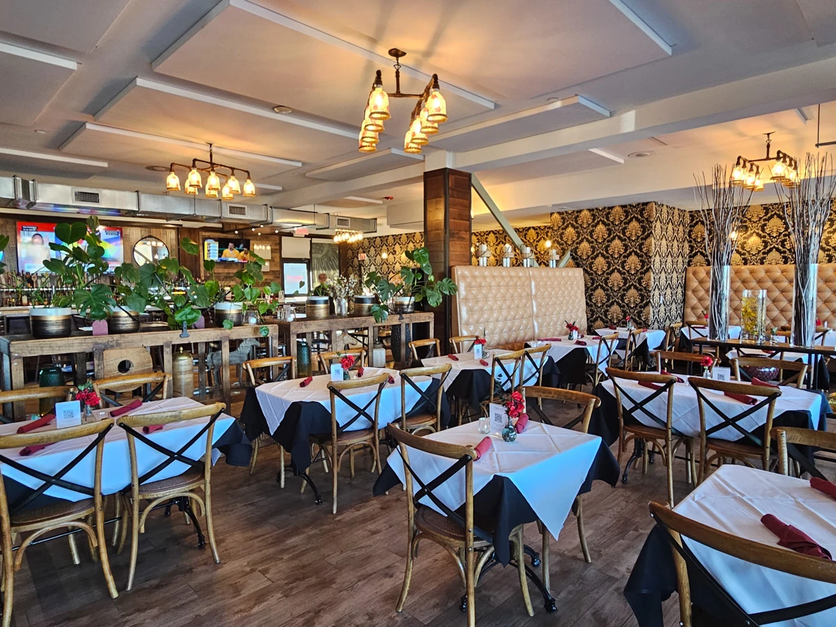 Photo of tables and chairs inside Pavilion Restaurant & Bar